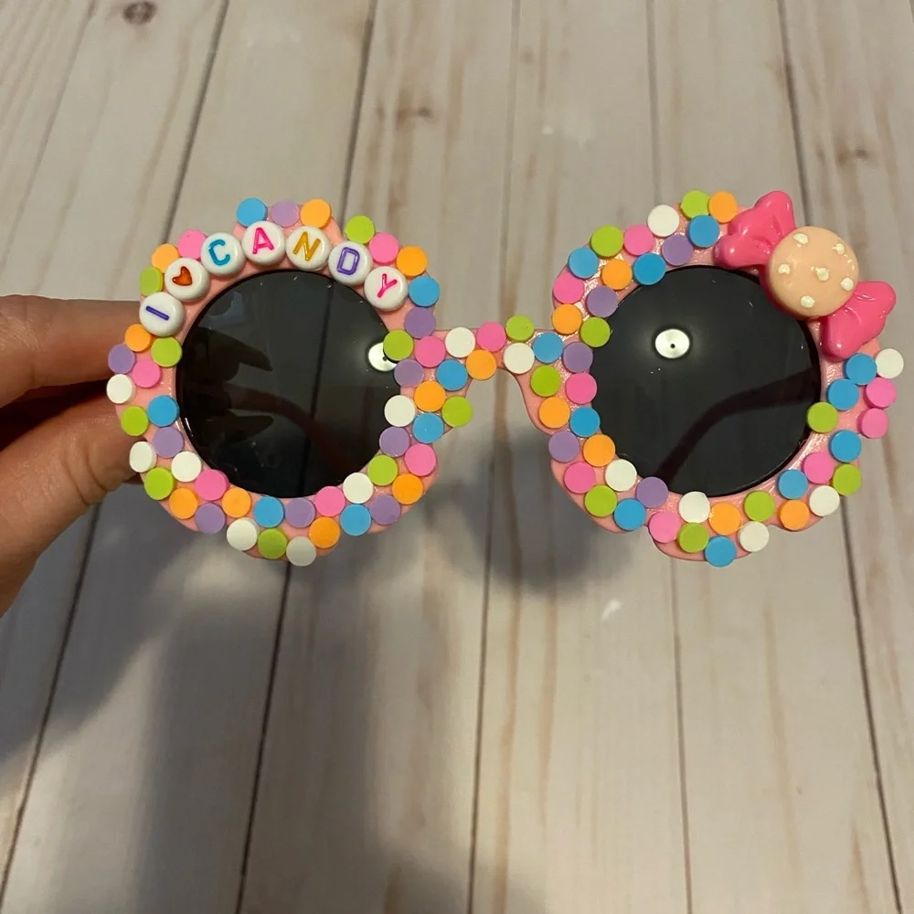 Girls pink flower shaped sunglasses w candy